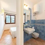 With Shared Pool, Aglientu Hébergement de vacances *